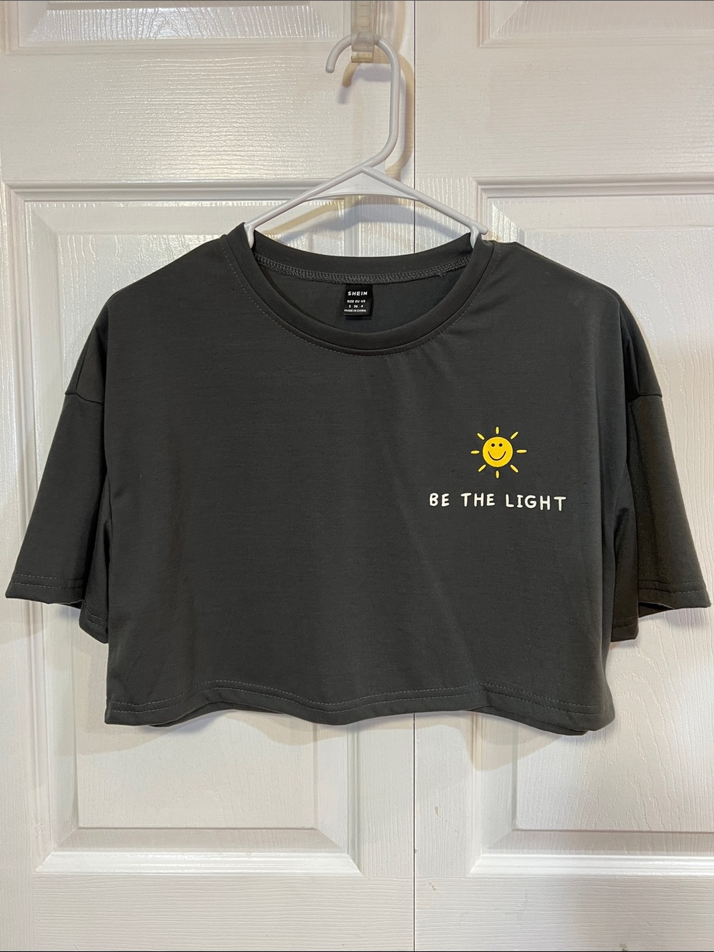 SHEIN Black Cropped Tee with Yellow Sun Graphic